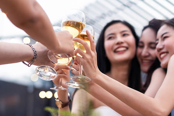 group-of-asian-woman-friends-drinking-beer-alcohol
